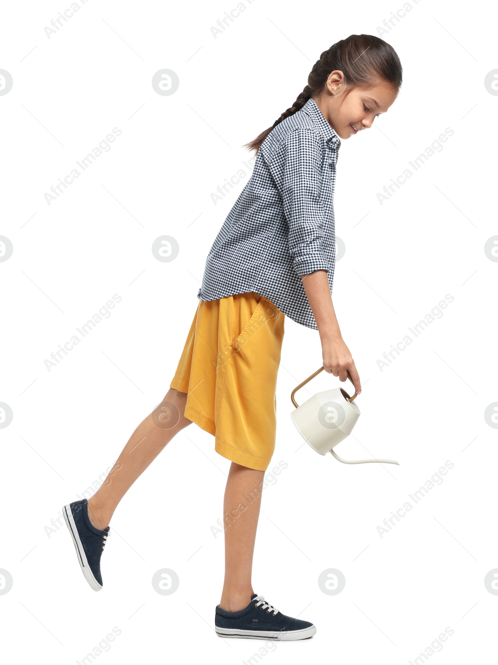 Photo of Girl with watering can pretending to be gardener on white background. Dreaming of future profession