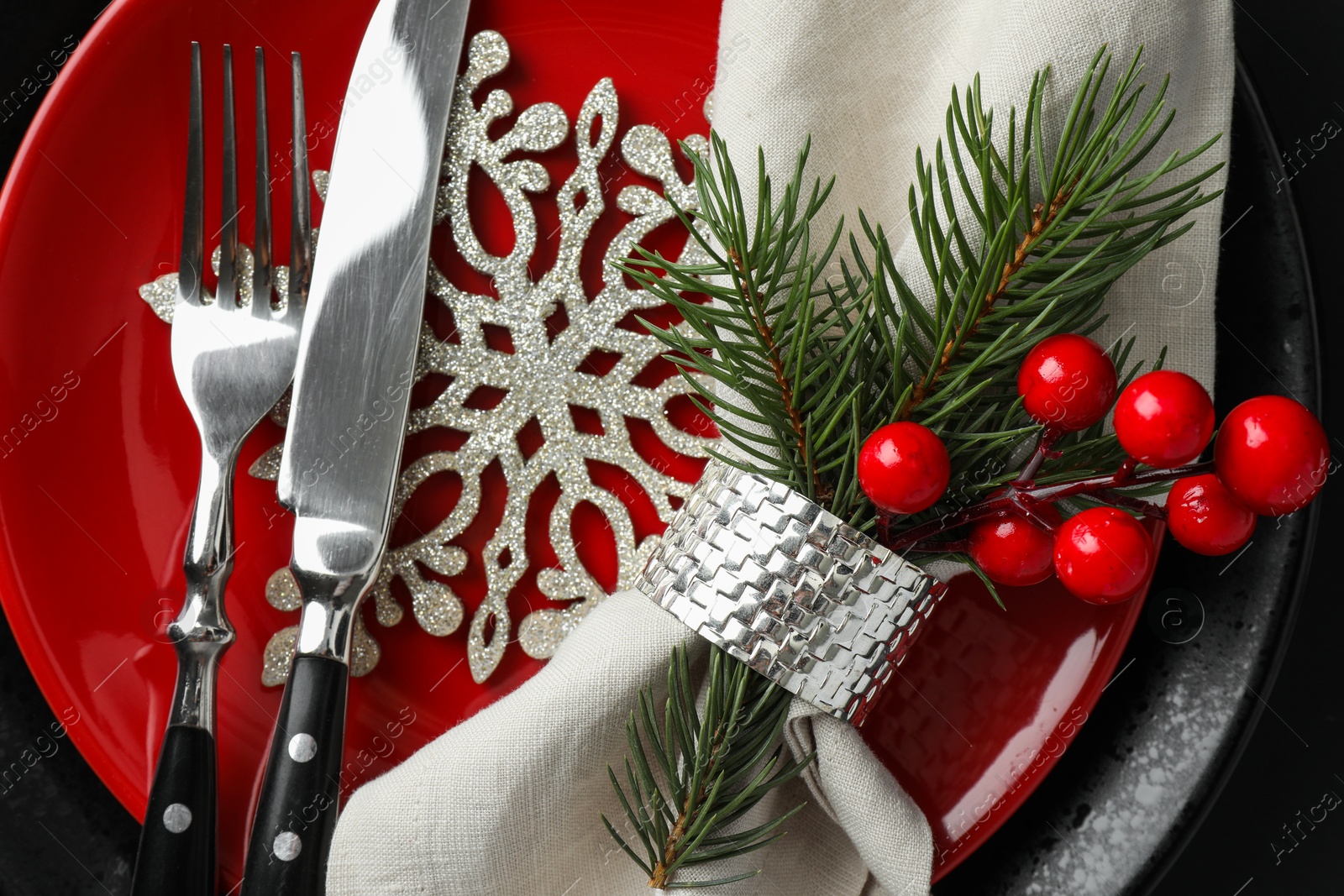 Photo of Christmas table setting with festive decor, top view