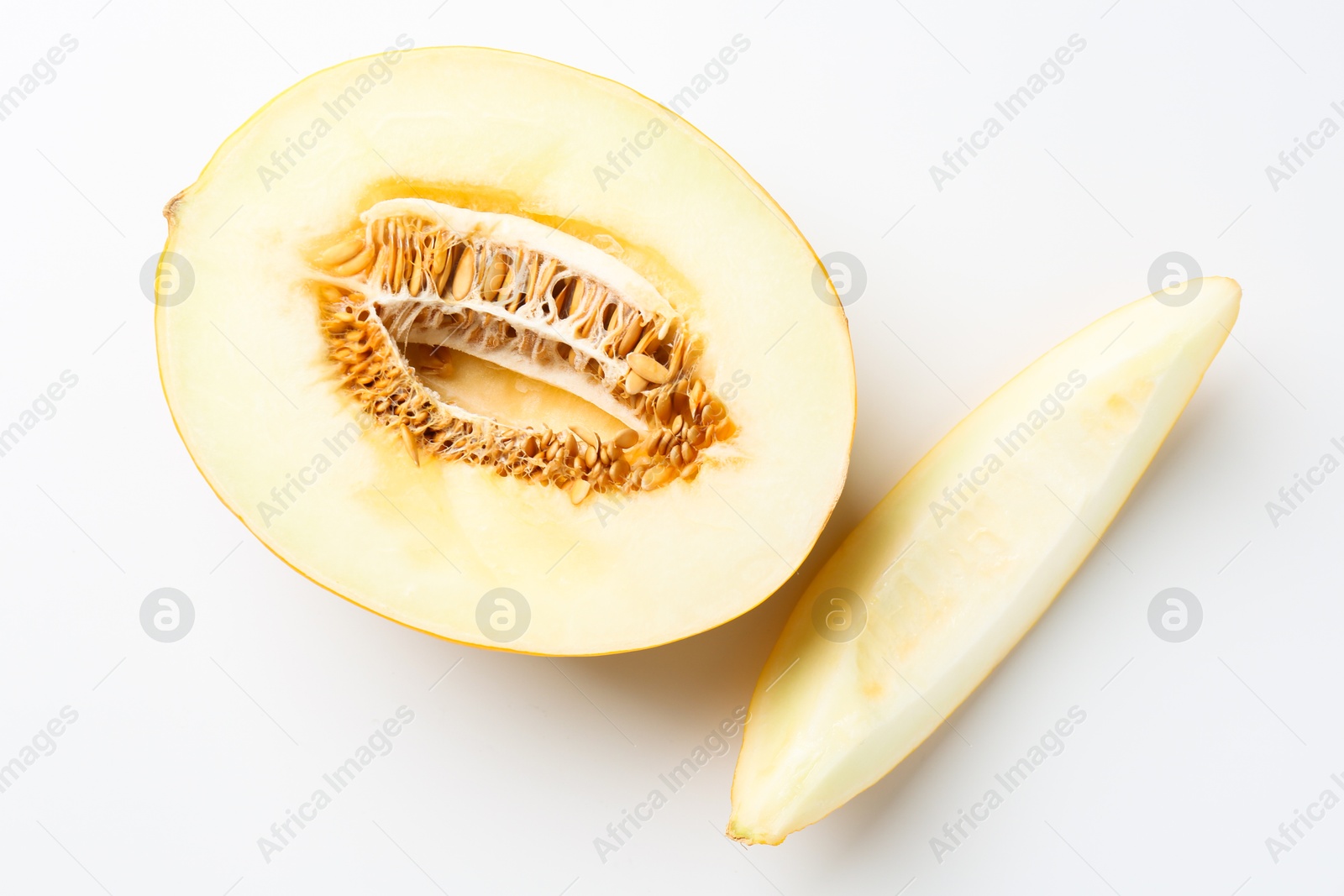 Photo of Fresh cut melon on white background, top view