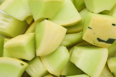 Photo of Many pieces of sweet honeydew melon, closeup