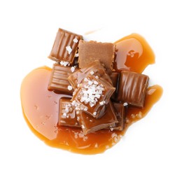 Photo of Tasty candies with salted caramel isolated on white, top view