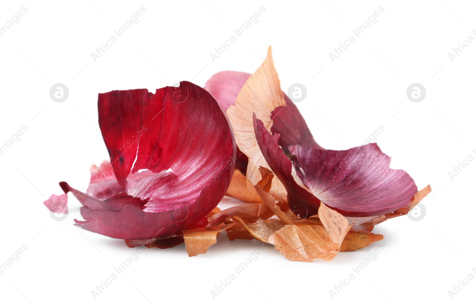 Photo of Pile of onion peels isolated on white