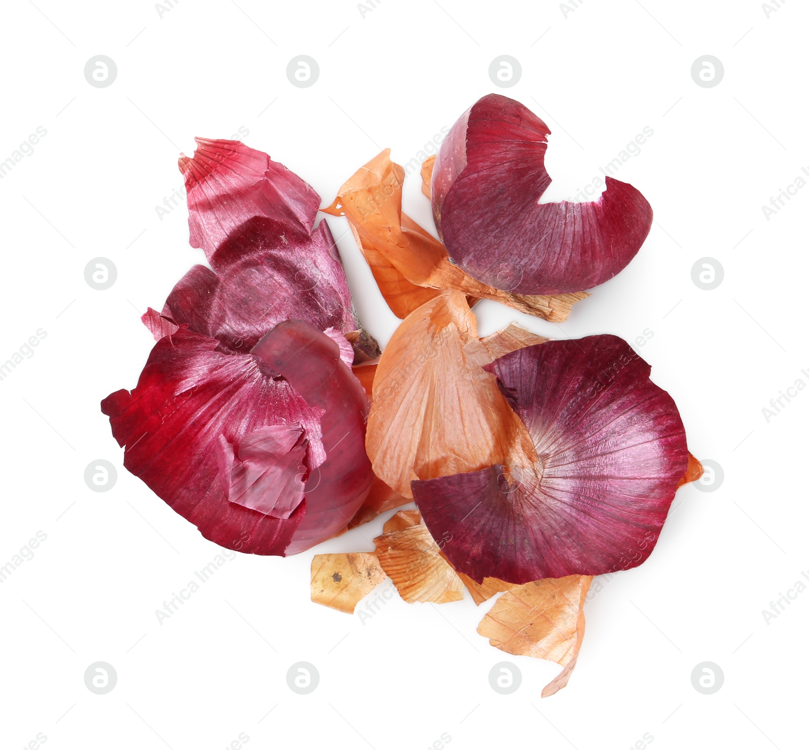 Photo of Onion peels isolated on white, top view