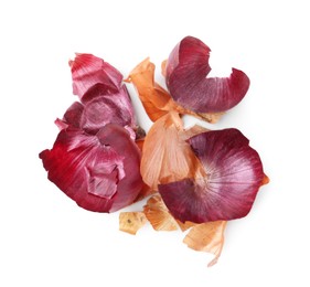 Photo of Onion peels isolated on white, top view