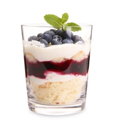 Photo of Tasty trifle dessert. Sponge cake, blueberries, jam and whipped cream in glass isolated on white