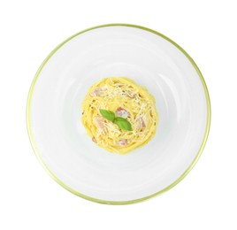 Photo of Plate with delicious pasta Carbonara isolated on white, top view