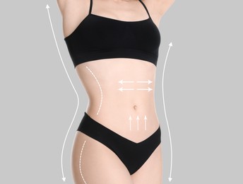 Image of Woman with perfect slim body on light grey background, closeup. Figure correction arrows