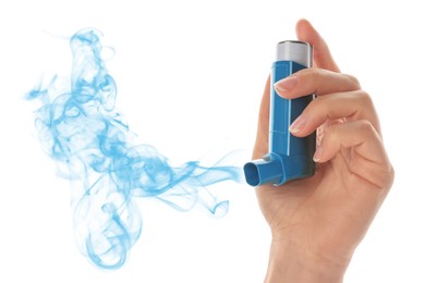 Asthma treatment. Woman holding inhaler on white background, closeup. Aerosolized medication coming out of device