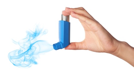 Asthma treatment. Woman holding inhaler on white background, closeup. Aerosolized medication coming out of device