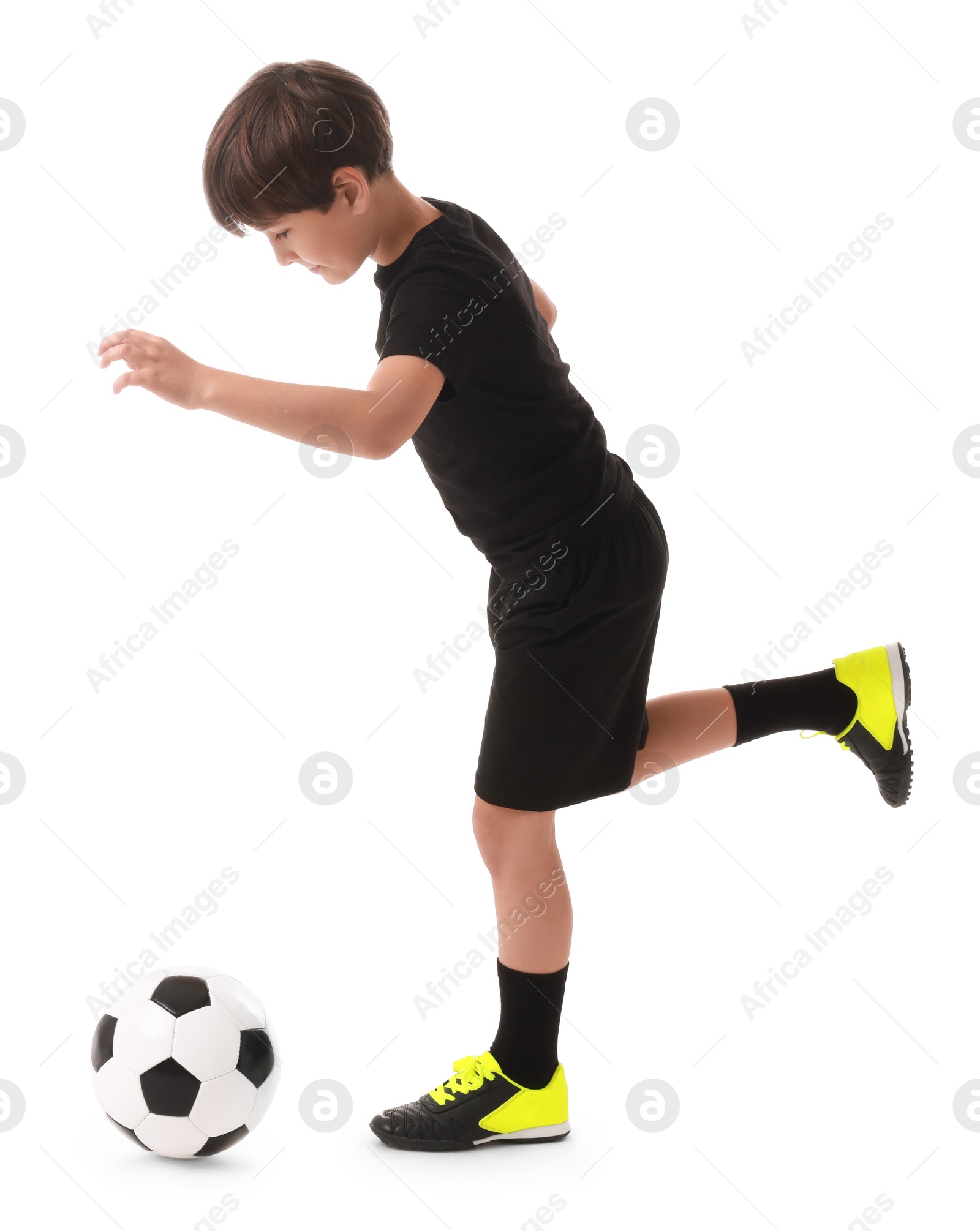 Photo of Boy with soccer ball playing football on white background