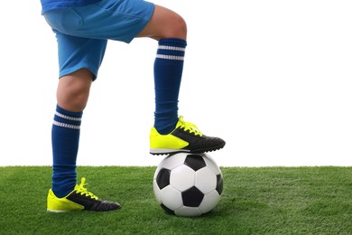 Photo of Football player with soccer ball on artificial grass against white background, closeup