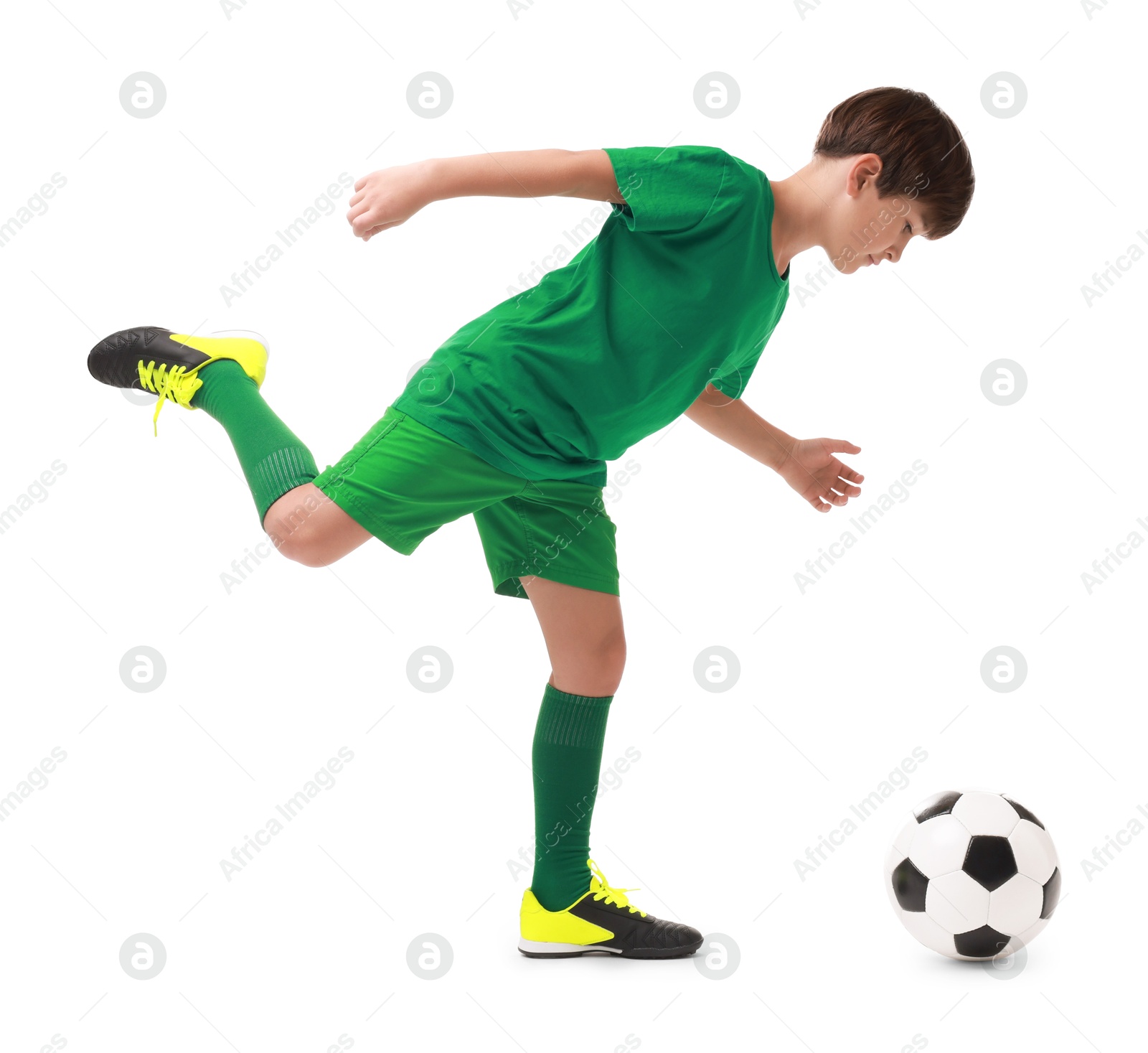 Photo of Boy with soccer ball playing football on white background