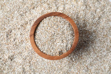 Photo of Bowl with fresh rye bran, top view