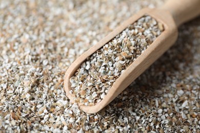 Photo of Scoop with fresh rye bran, closeup view