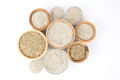 Photo of Fresh rye bran in bowls on white background, top view