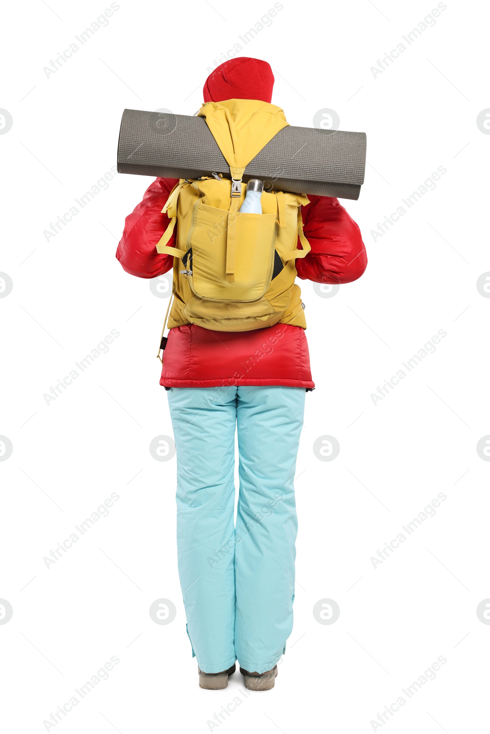 Photo of Woman with backpack and mat on white background, back view. Active tourism