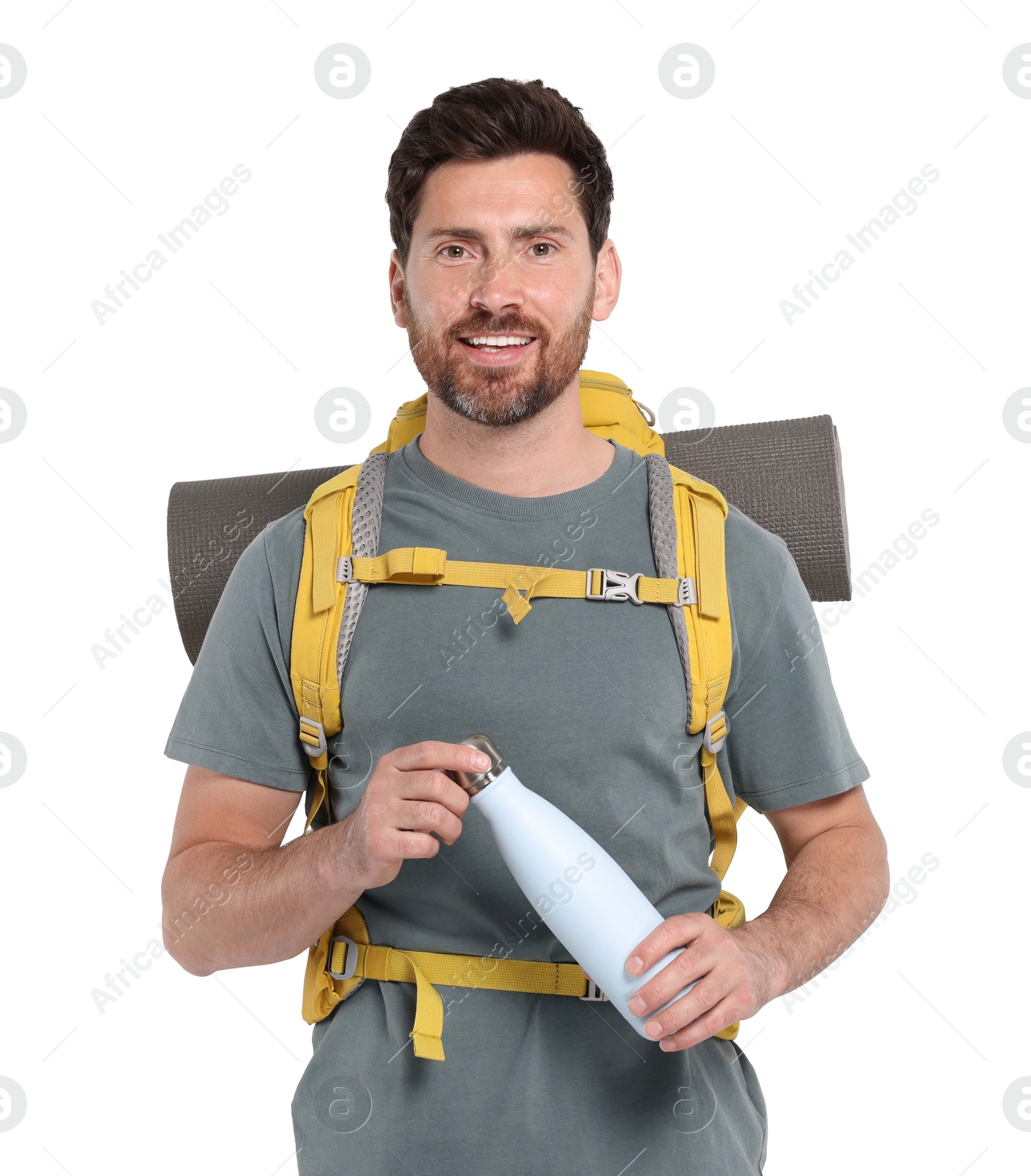 Photo of Happy man with backpack and thermo bottle on white background. Active tourism