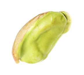 Photo of One peeled pistachio nut isolated on white