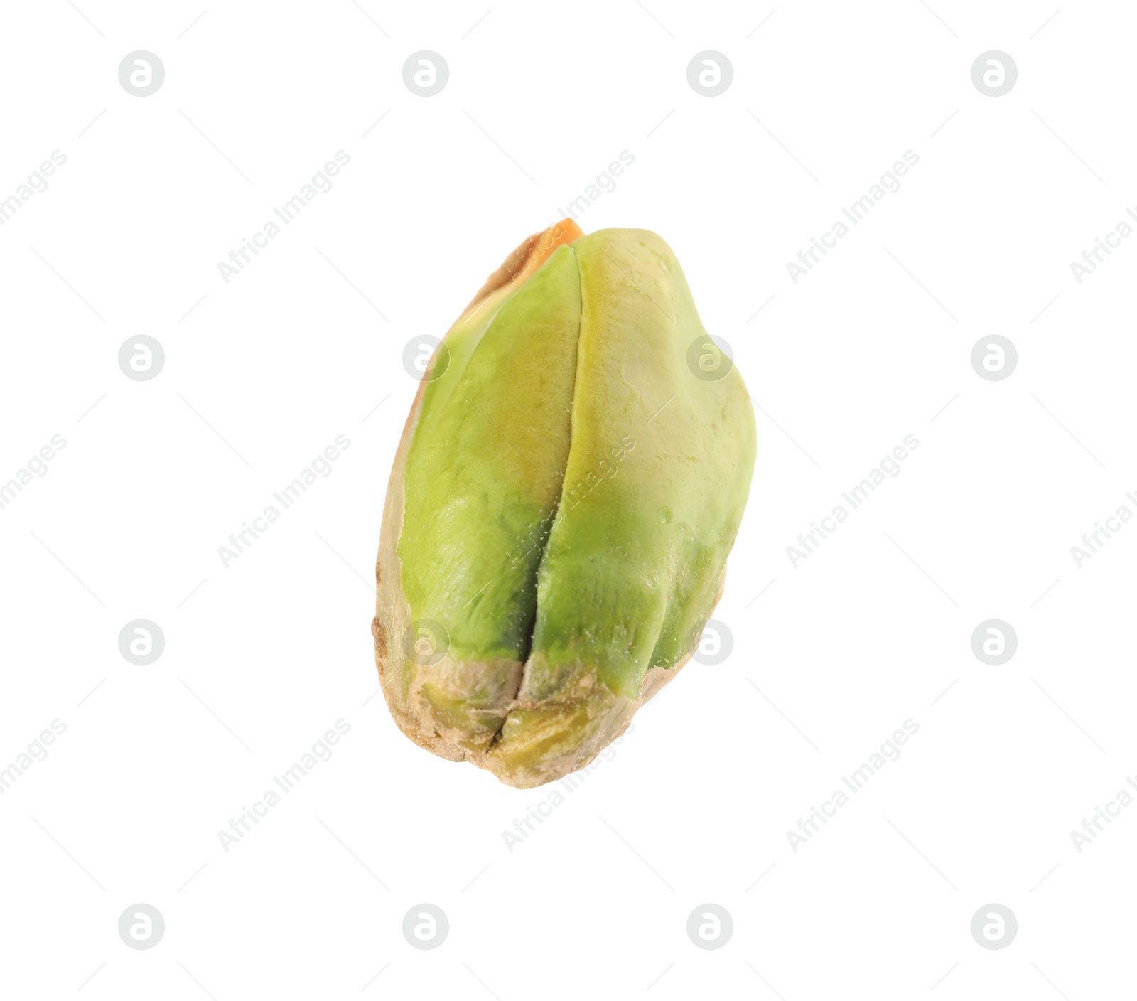 Photo of One peeled pistachio nut isolated on white