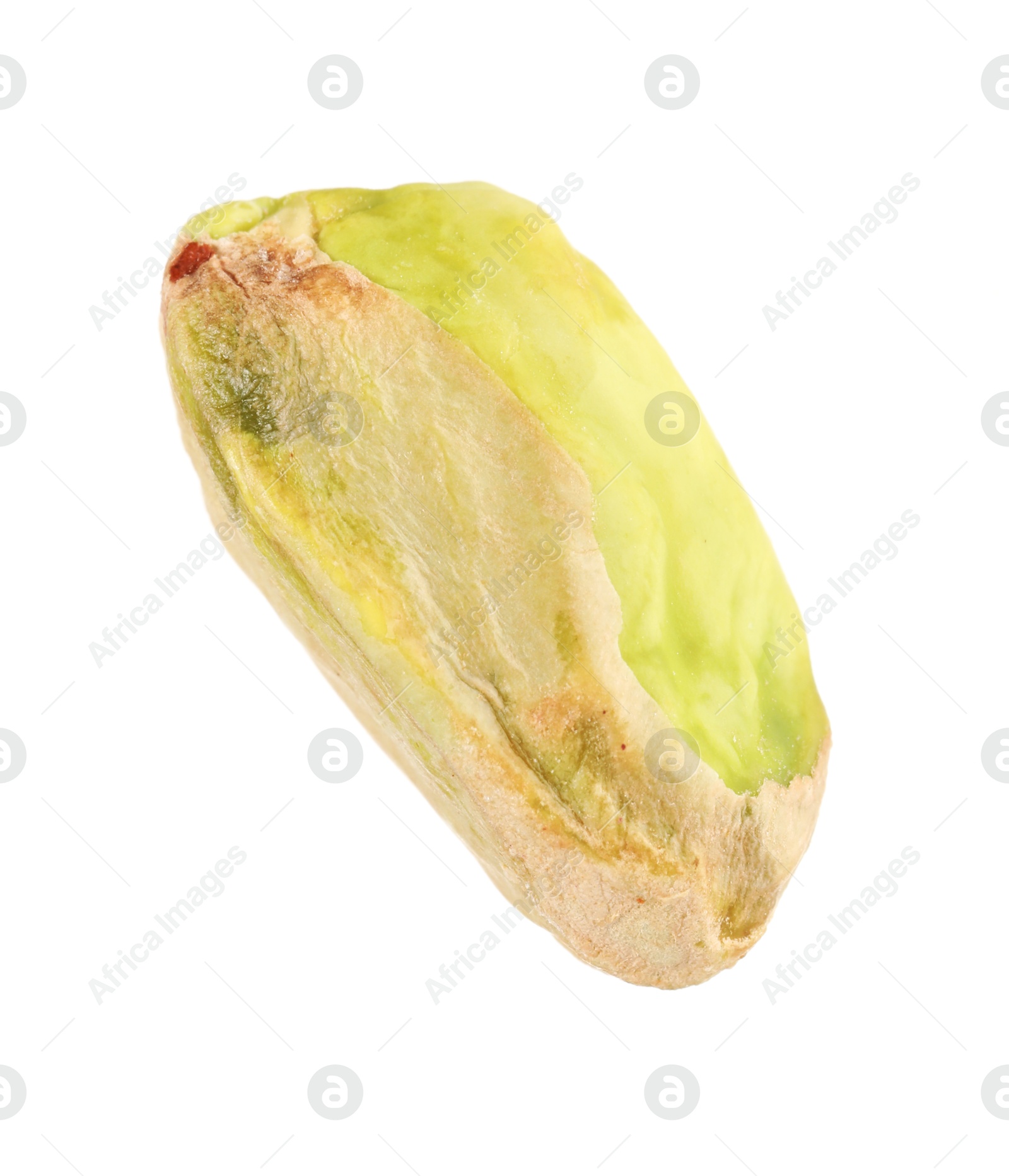 Photo of One peeled pistachio nut isolated on white