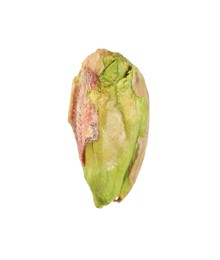 Photo of One peeled pistachio nut isolated on white