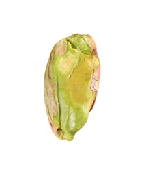 Photo of One peeled pistachio nut isolated on white