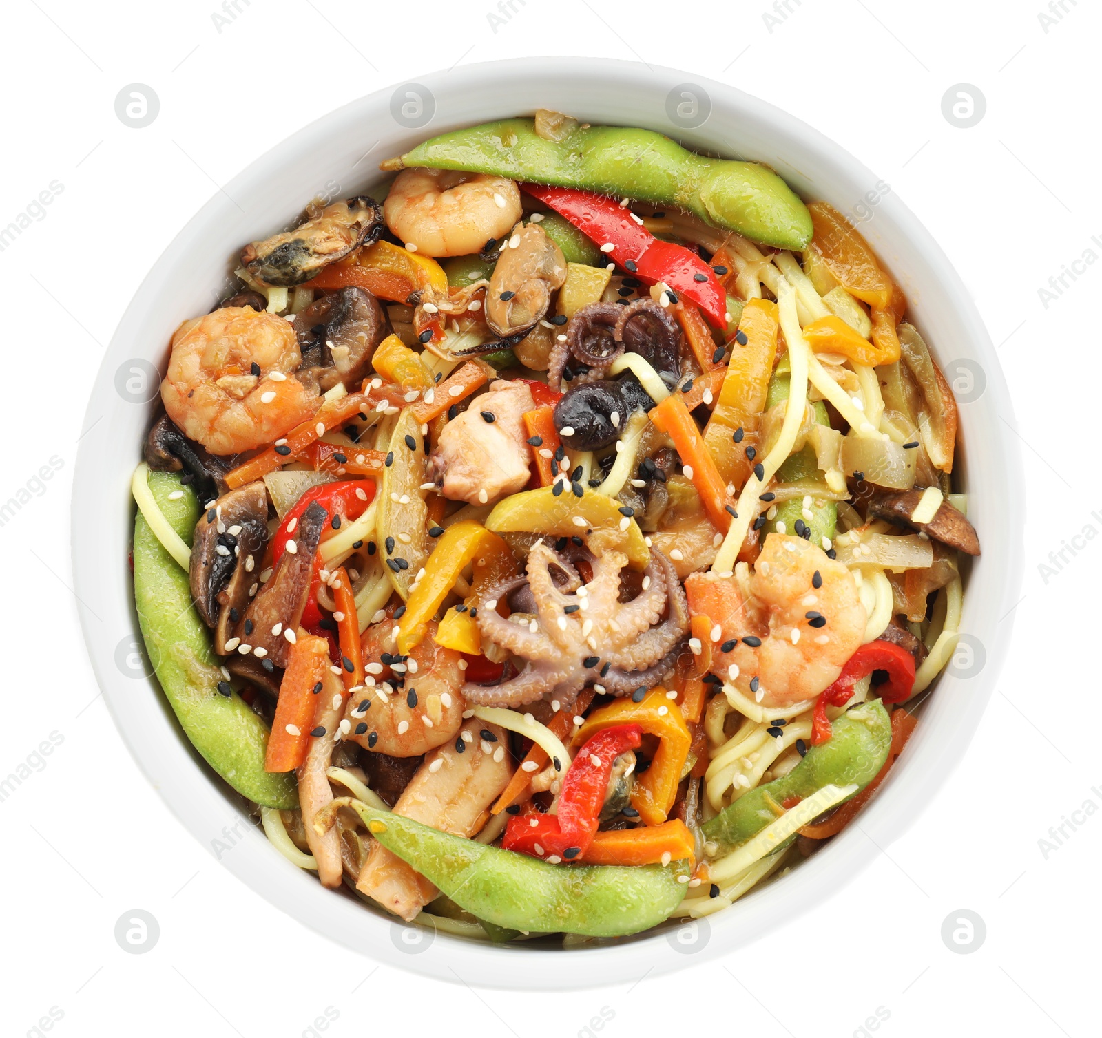 Photo of Stir-fry noodles with sea food in bowl isolated on white, top view