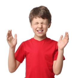 Portrait of scared little boy on white background