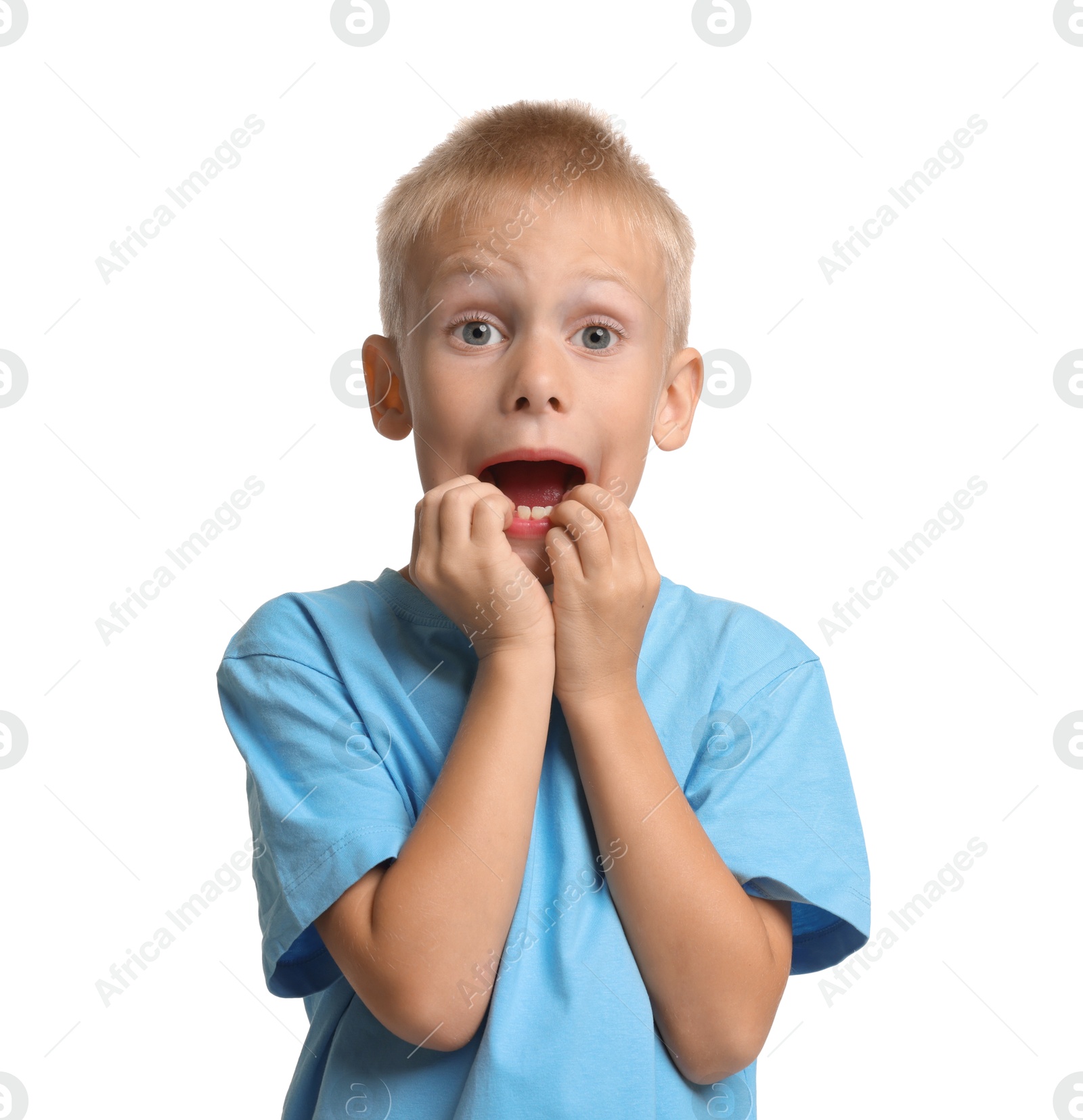 Photo of Portrait of scared little boy on white background