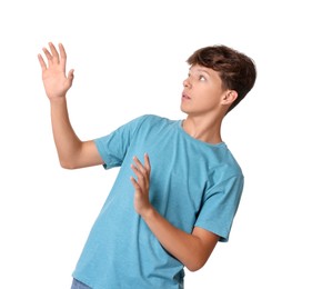 Photo of Portrait of scared teenage boy on white background