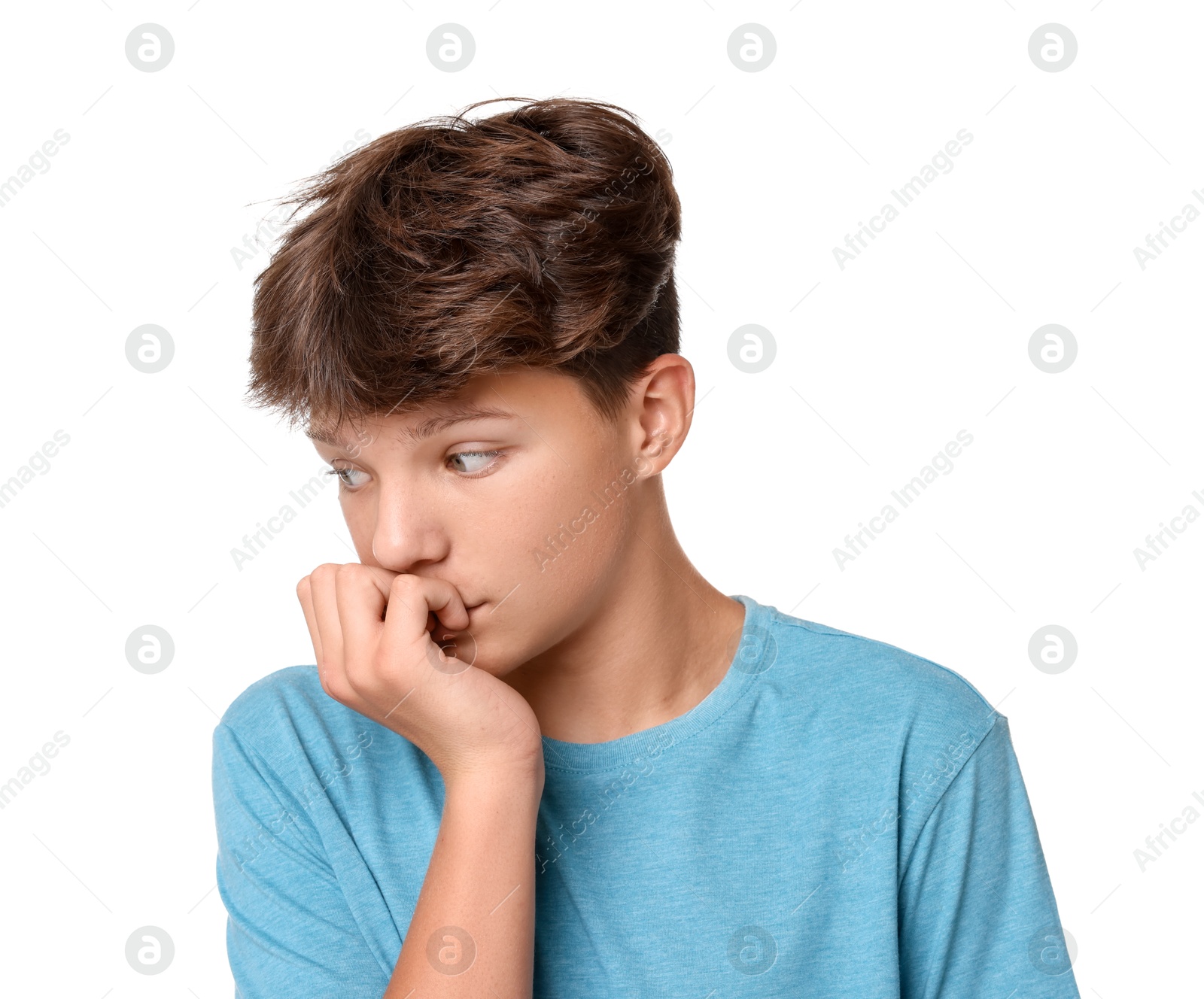 Photo of Portrait of scared teenage boy on white background