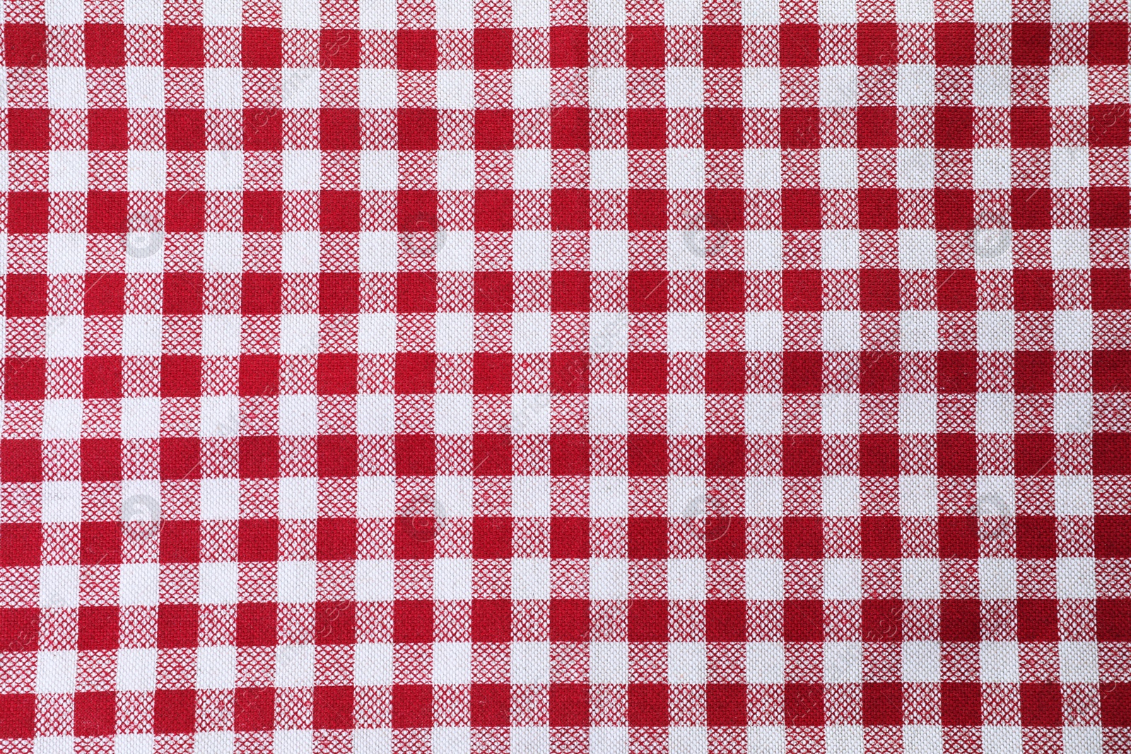 Photo of Tablecloth with checkered pattern as background, top view