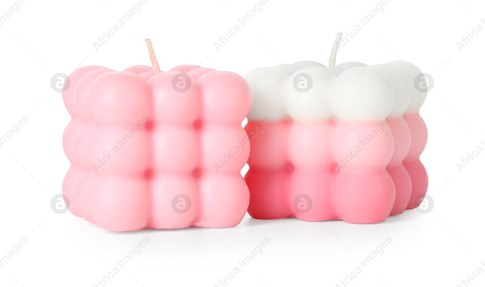 Photo of Two beautiful bubble candles isolated on white