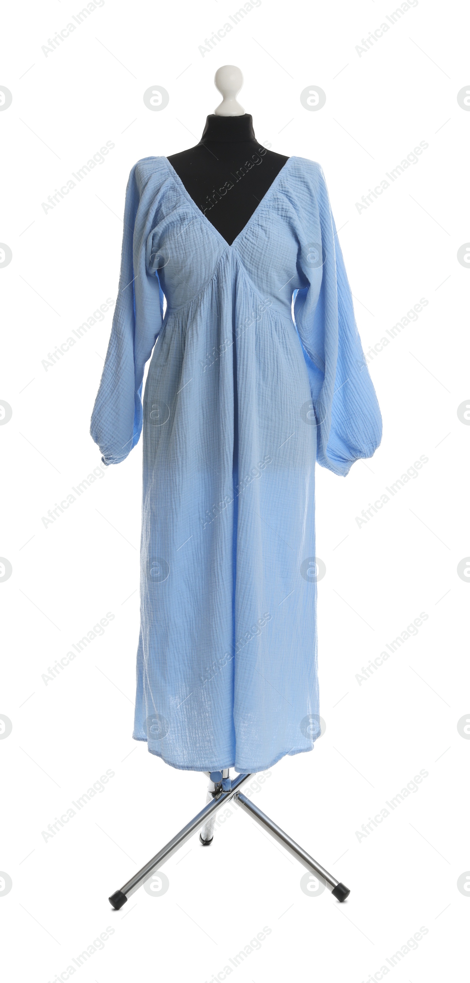 Photo of Female mannequin with light blue dress isolated on white