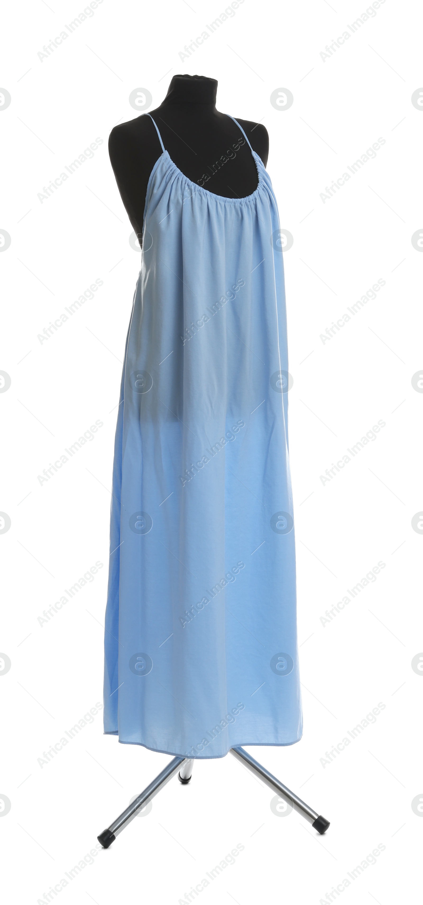 Photo of Female mannequin with light blue dress isolated on white