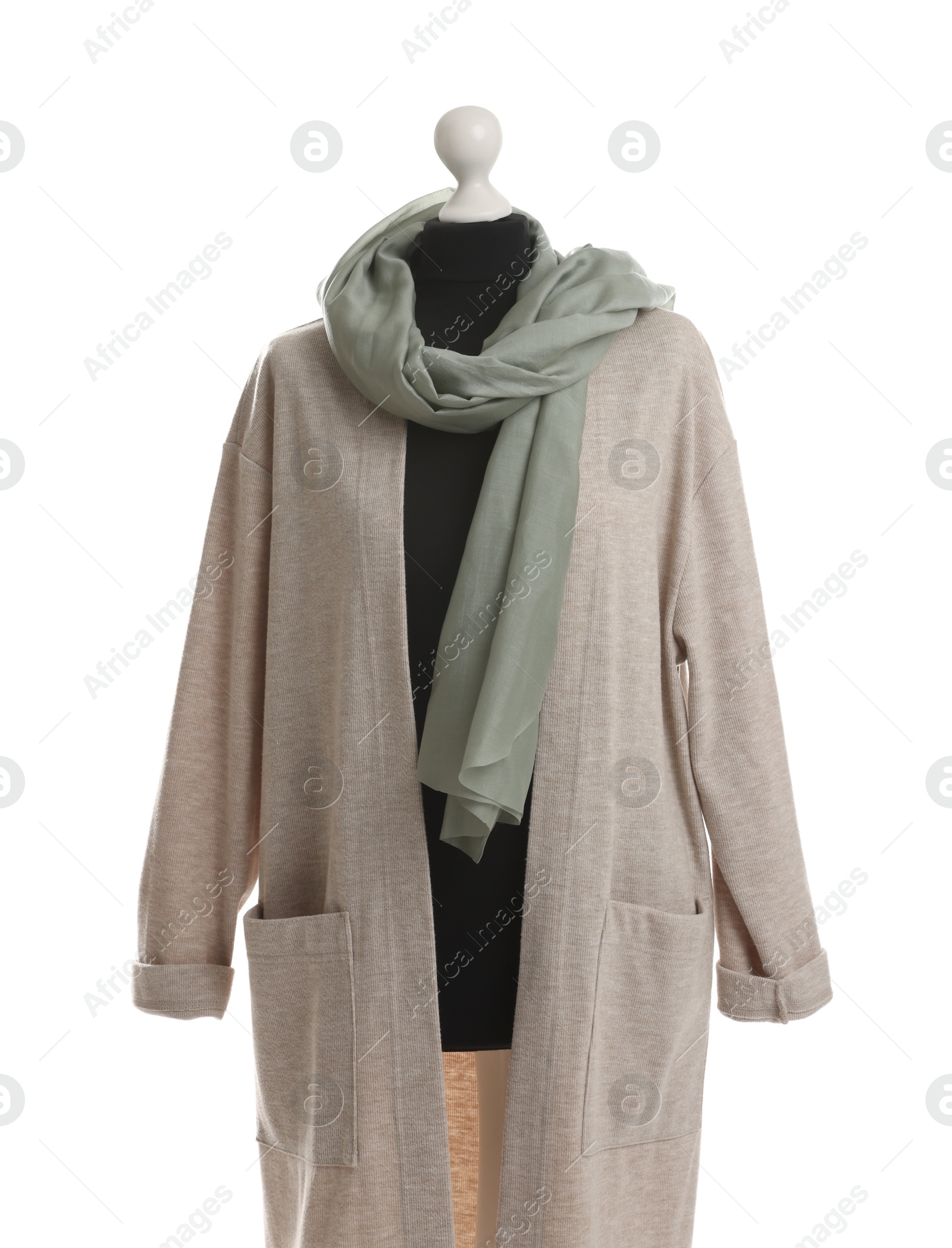 Photo of Female mannequin with beige cardigan and scarf isolated on white