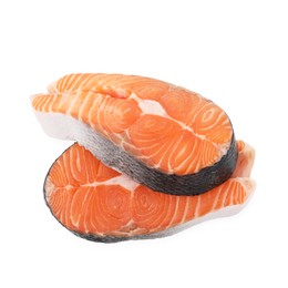 Photo of Steaks of fresh raw salmon isolated on white, top view