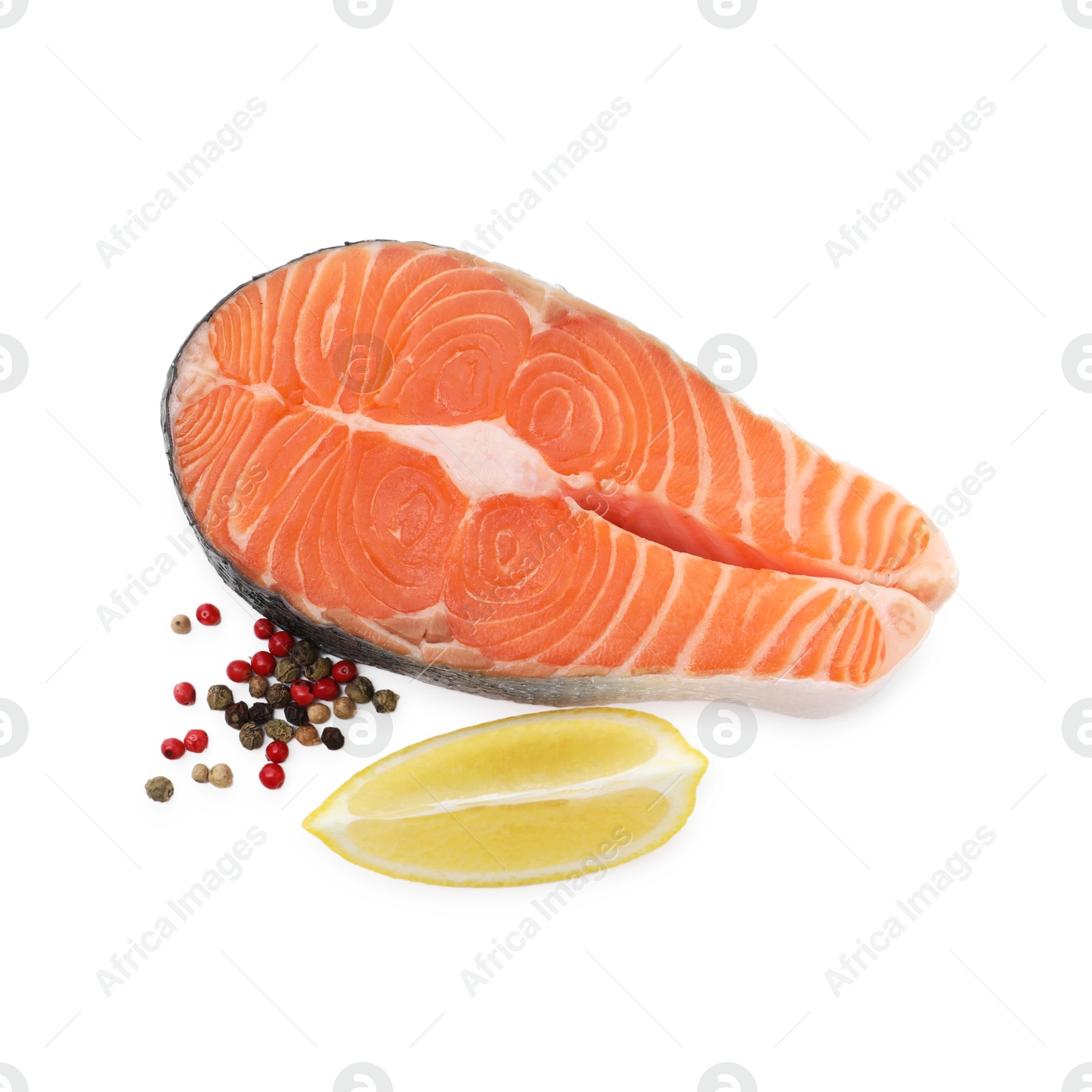 Photo of Steak of fresh raw salmon and spices isolated on white, top view