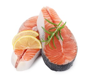 Photo of Steaks of fresh raw salmon and spices isolated on white