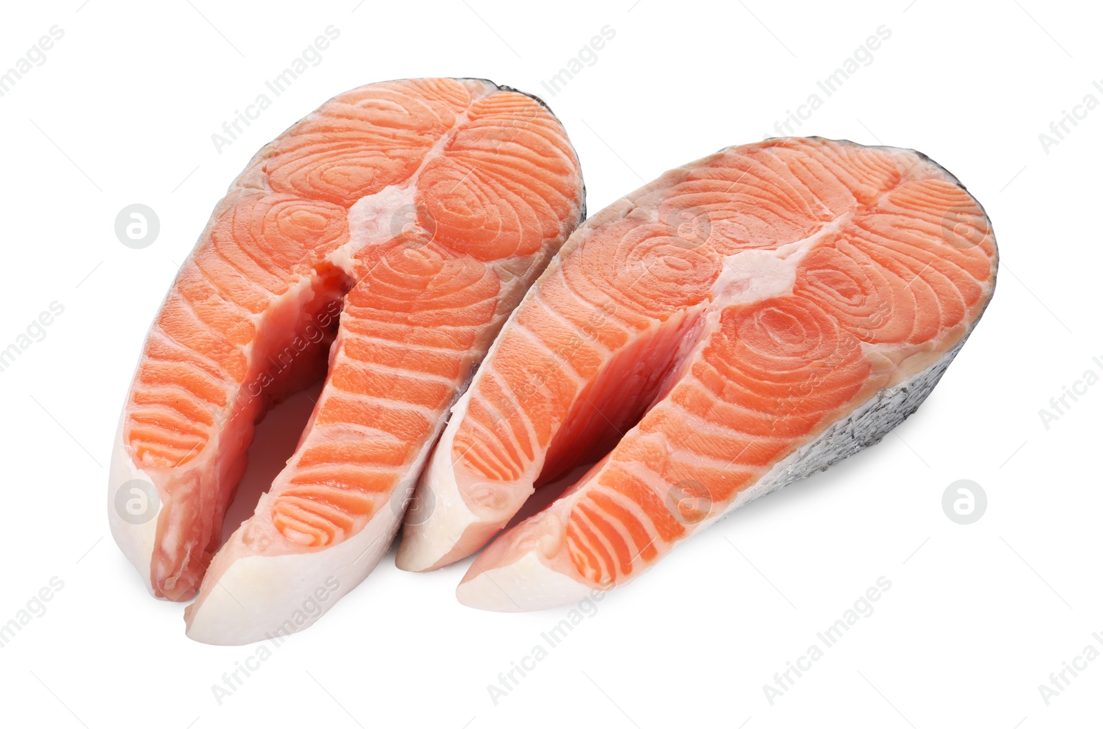 Photo of Steaks of fresh raw salmon isolated on white