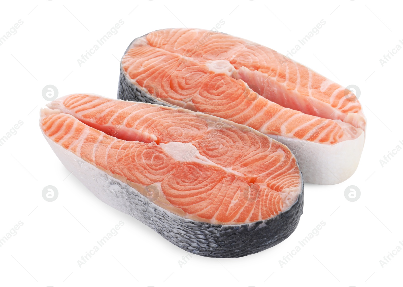 Photo of Steaks of fresh raw salmon isolated on white