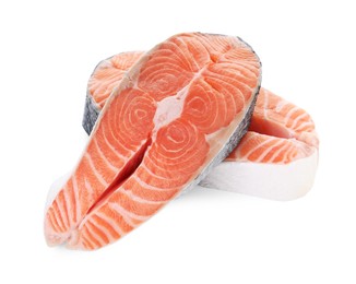 Photo of Steaks of fresh raw salmon isolated on white