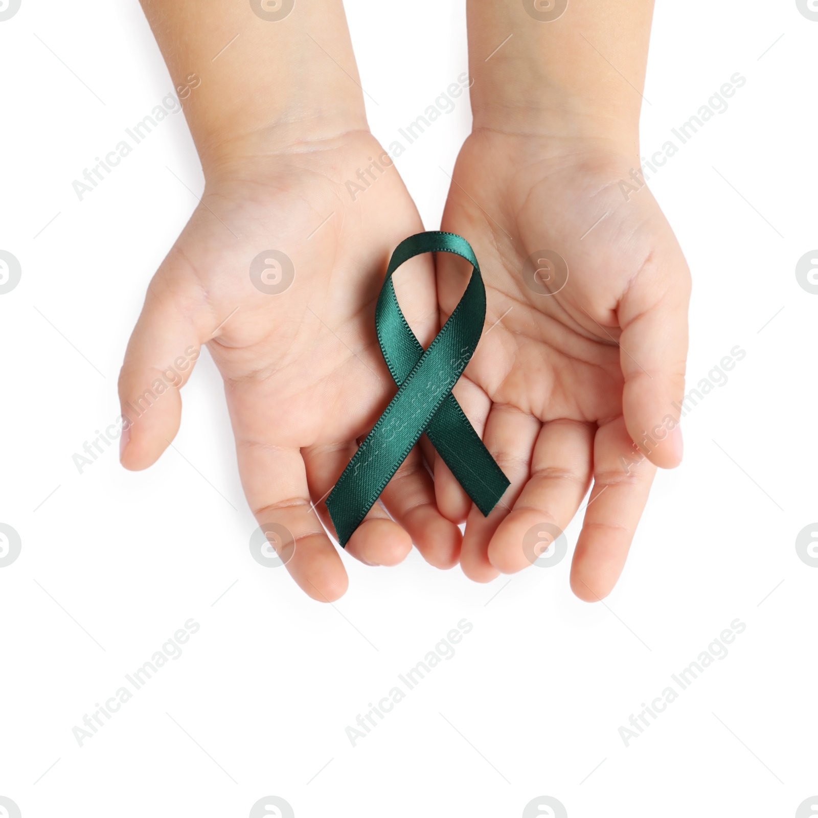 Photo of Child with teal ribbon on white background, top view. Ovarian cancer and gynecological disorders awareness