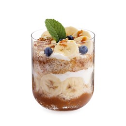 Photo of Tasty trifle dessert. Sponge cake, blueberries, banana and whipped cream in glass isolated on white