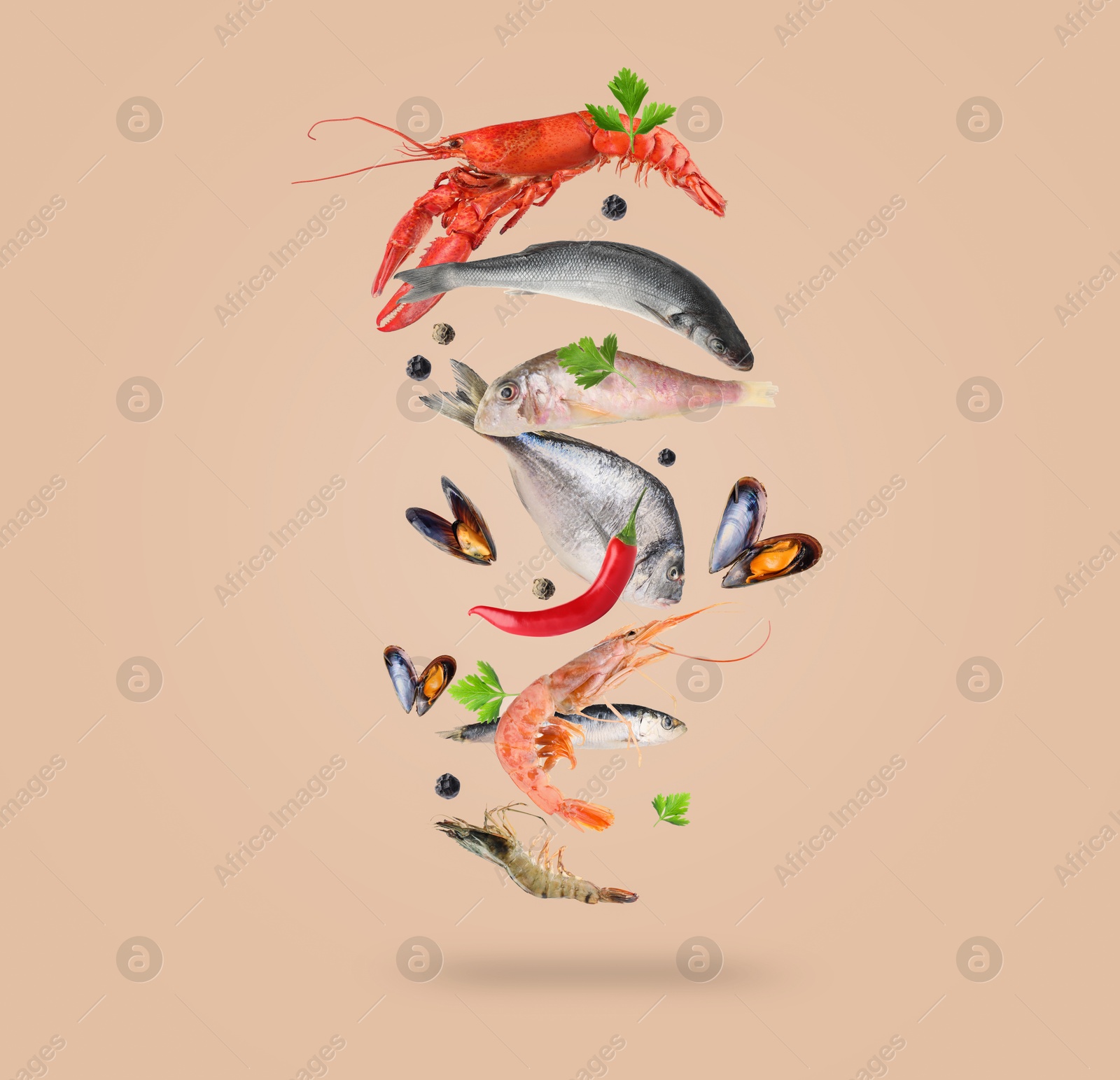 Image of Different sea food in air on dark beige background