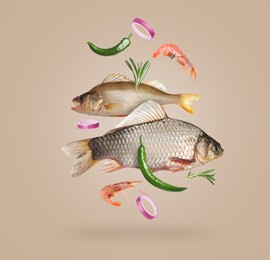 Image of Different sea food in air on dark beige background