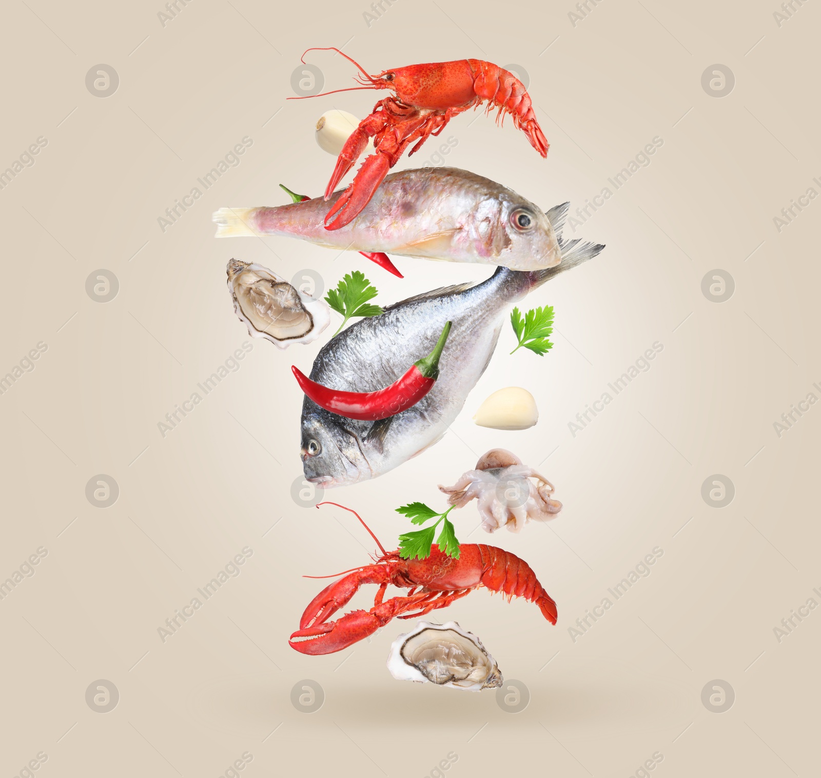 Image of Different sea food in air on beige background