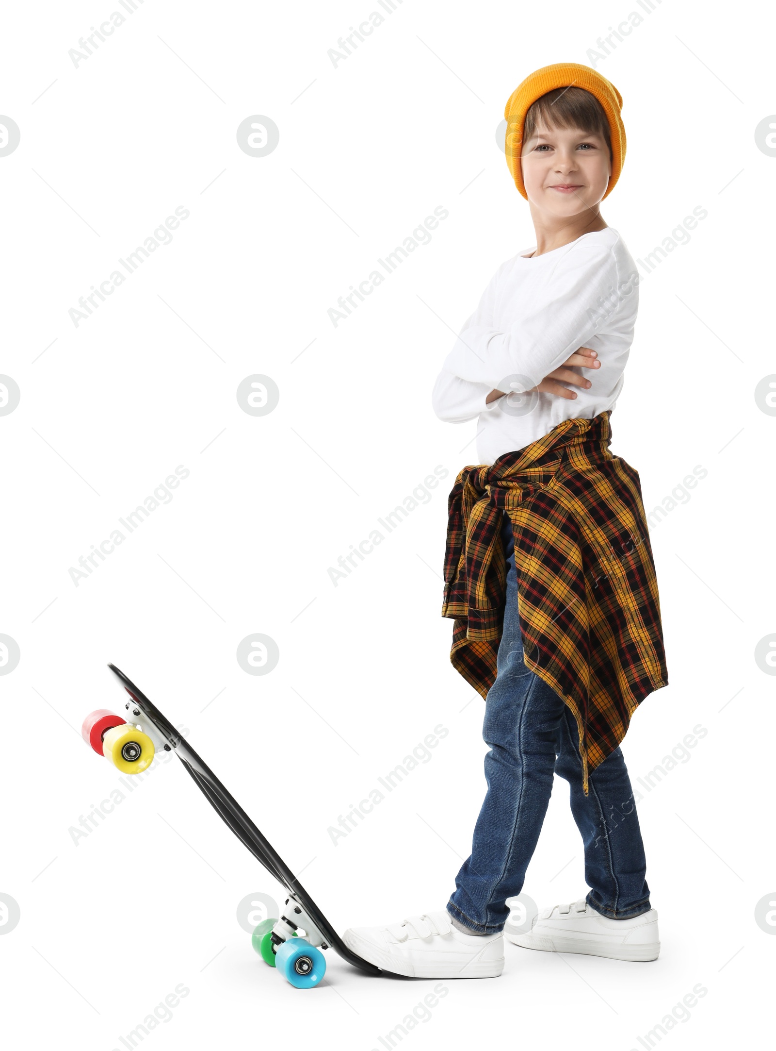 Photo of Little boy with skateboard on white background