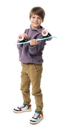 Photo of Little boy with skateboard on white background