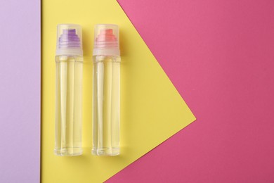 Photo of Glue and colorful paper on pink background, top view. Space for text